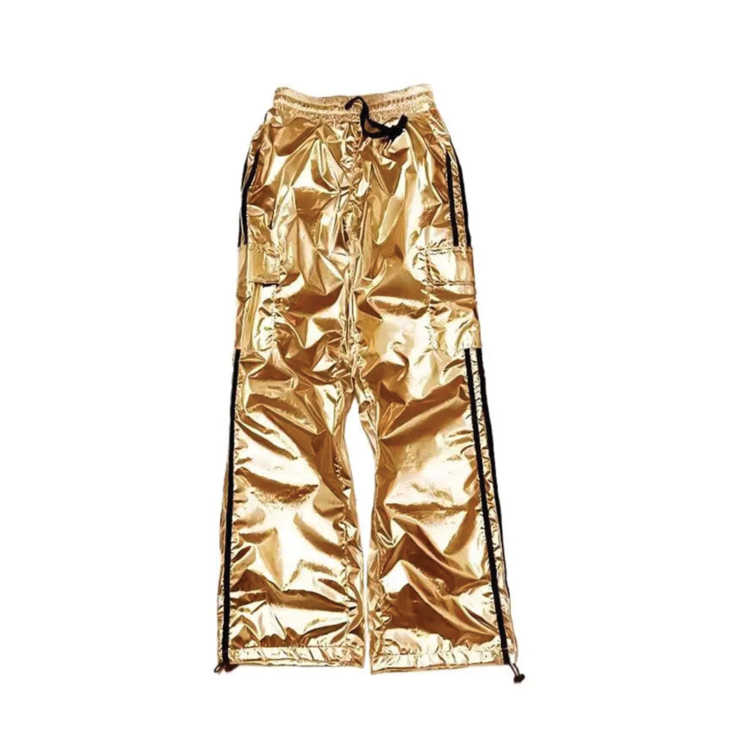 Metallic silver wide-leg jogger pants with adjustable drawstring and bold side stripe zippers