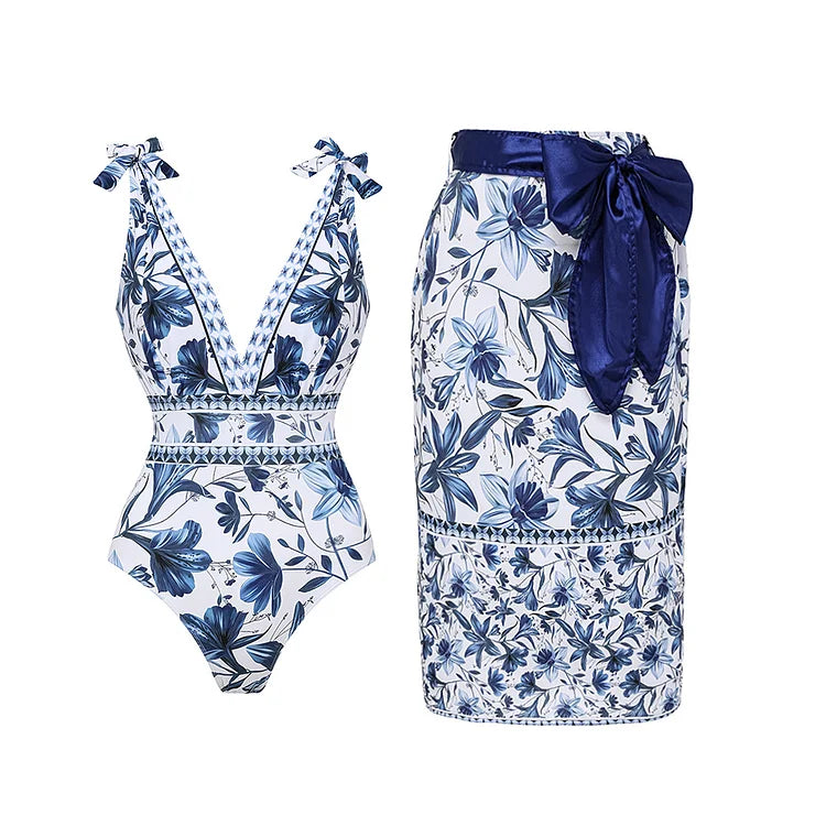 Blue white print V-neck lace-up one-piece swimsuit with matching skirt overlay, beach chic style