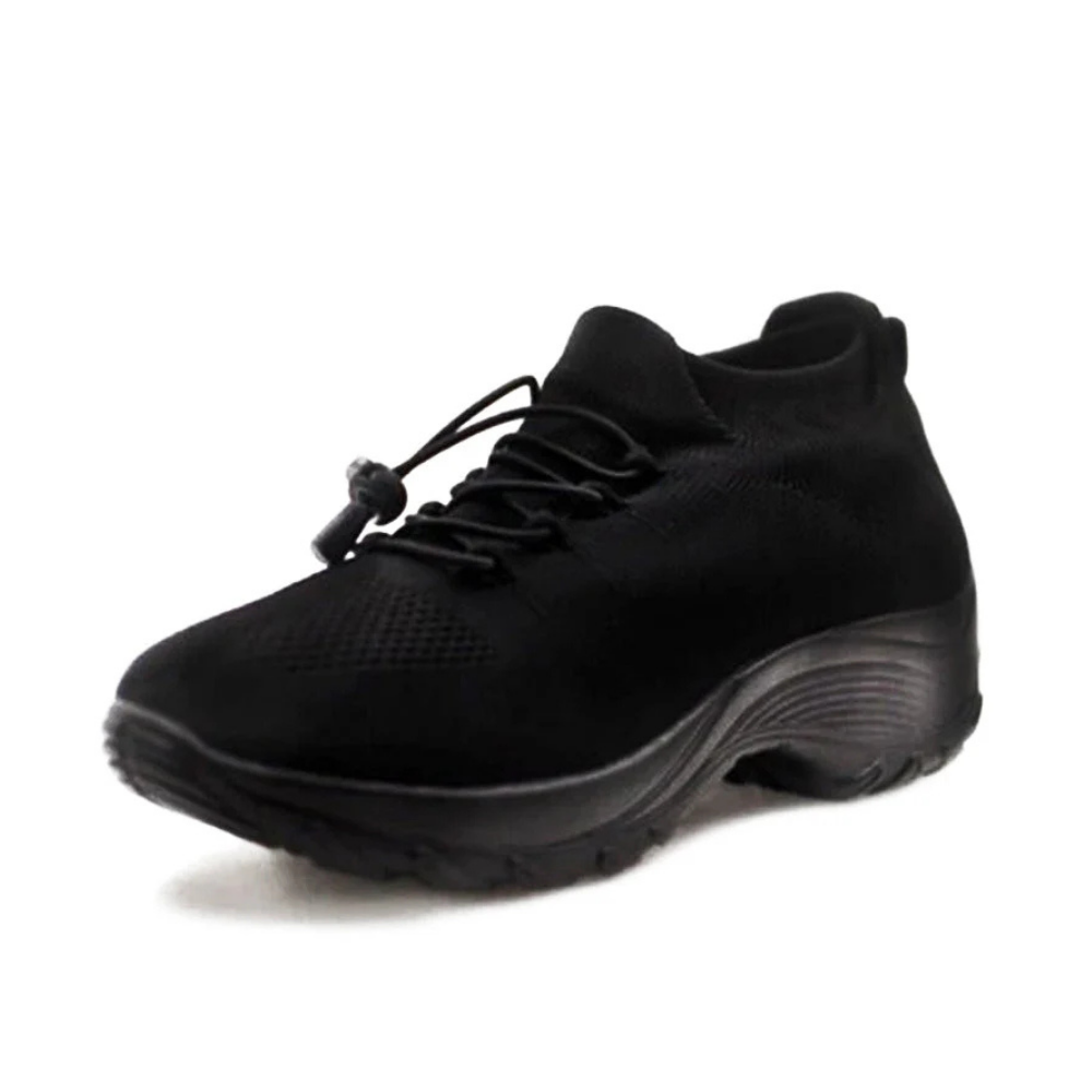 Women's white orthopedic sneakers with breathable upper, arch support, and shock-absorbing sole for daily wear
