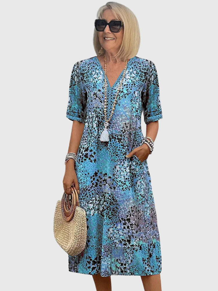 Women's printed midi dress V-neck relaxed silhouette with flattering drape and short sleeves