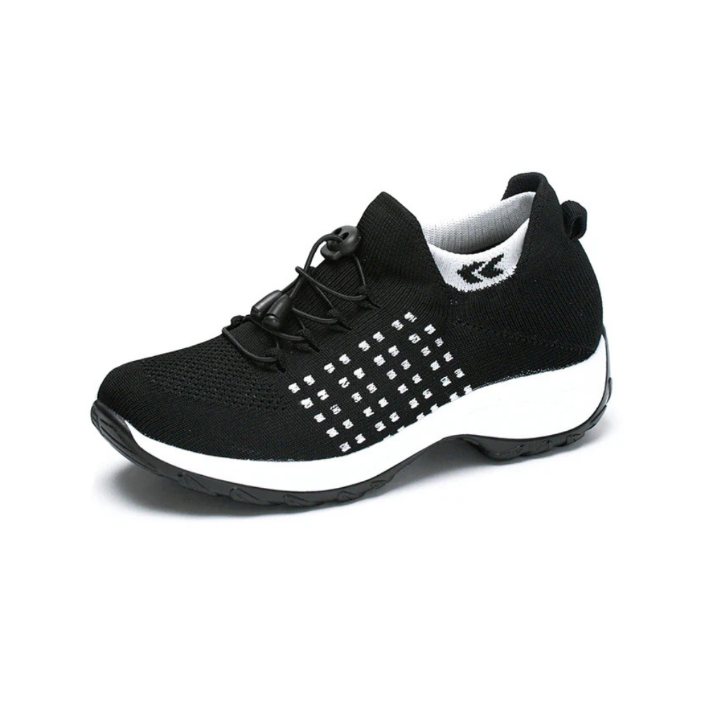 Women's white orthopedic sneakers with breathable upper, arch support, and shock-absorbing sole for daily wear