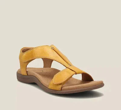 Beige orthopedic sandals with built-in arch support cushioned sole and adjustable straps for all-day comfort
