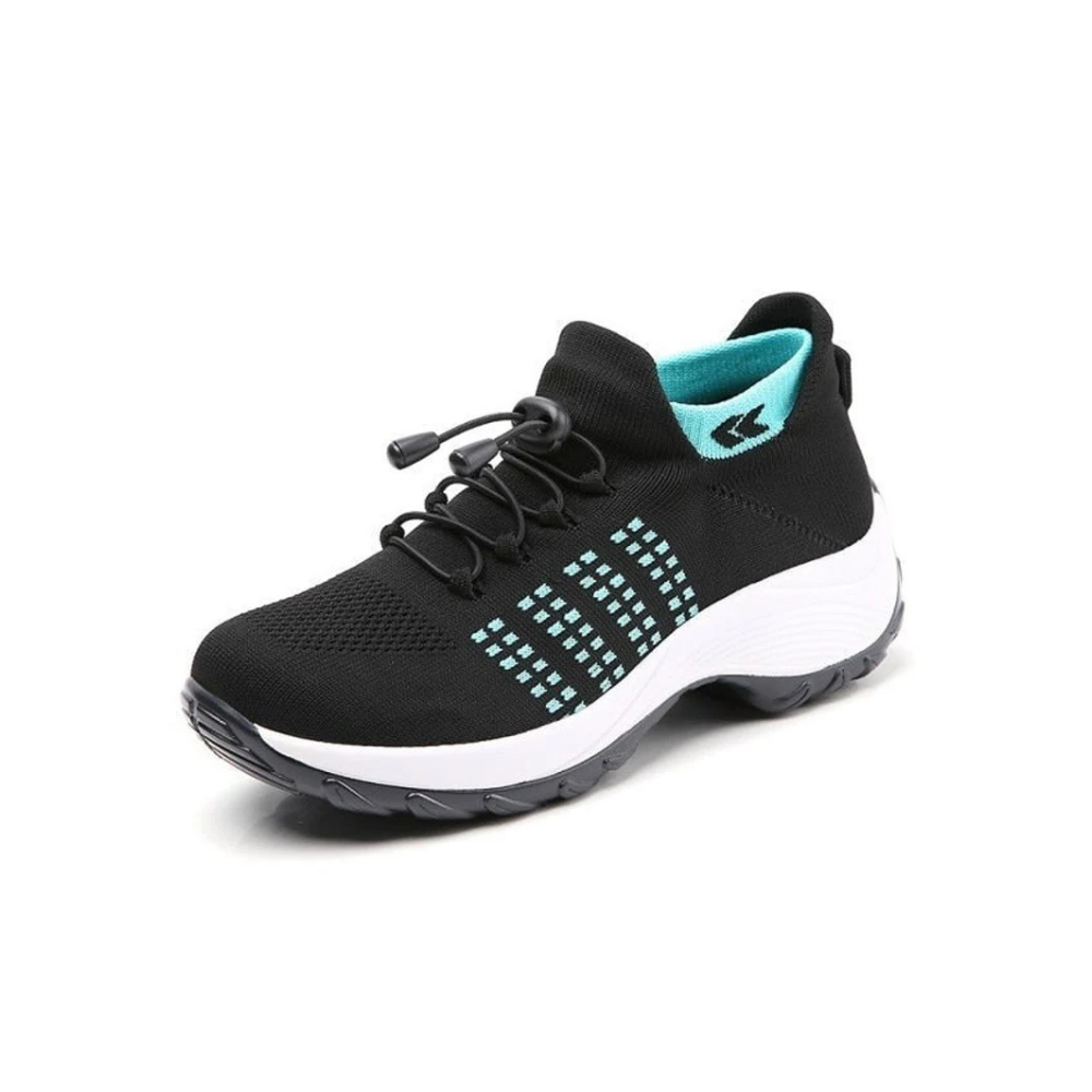Women's white orthopedic sneakers with breathable upper, arch support, and shock-absorbing sole for daily wear