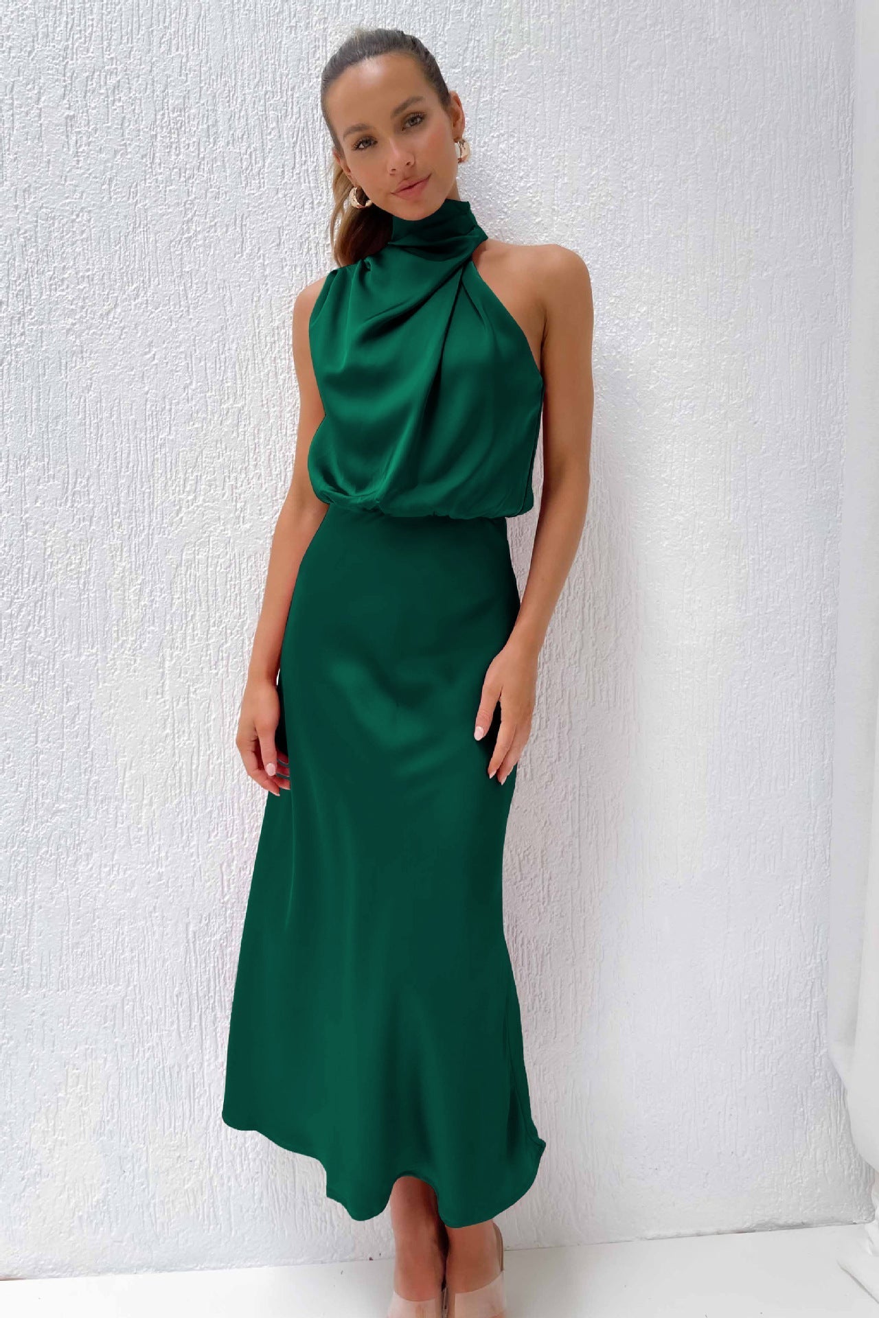 Ivory satin maxi halter dress with sleeveless cut and elegant draped silhouette for women