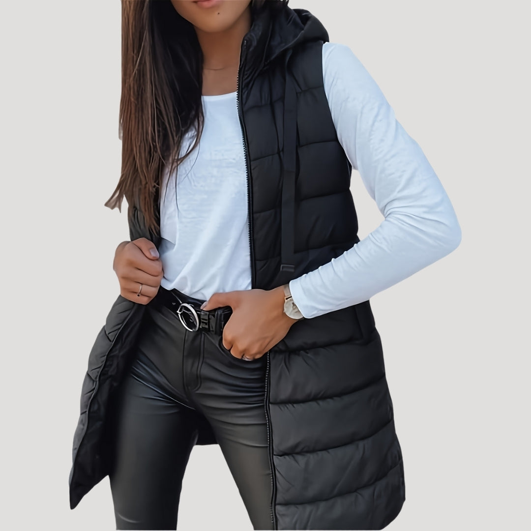 Women's lightweight hooded puffer vest with padded insulation, slim silhouette for winter layering