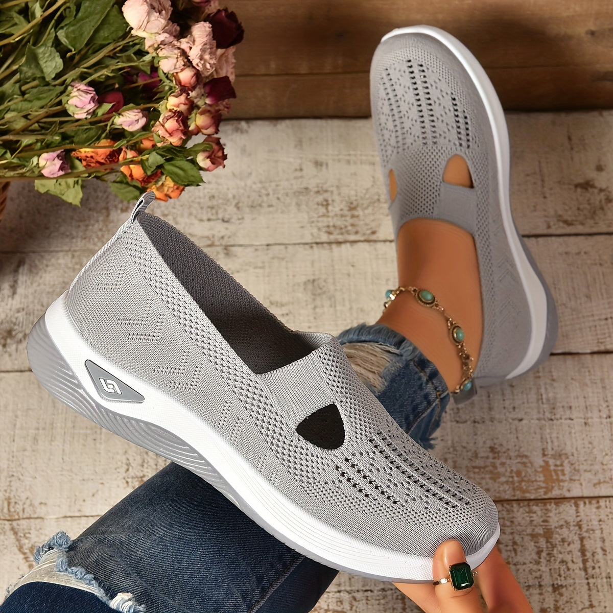 Women's slip-on knit sneakers in neutral tone, lightweight breathable mesh upper with supportive rubber sole