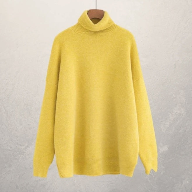 Autumn relaxed-fit turtleneck sweater in solid neutral tone with clean minimalist lines for everyday wear