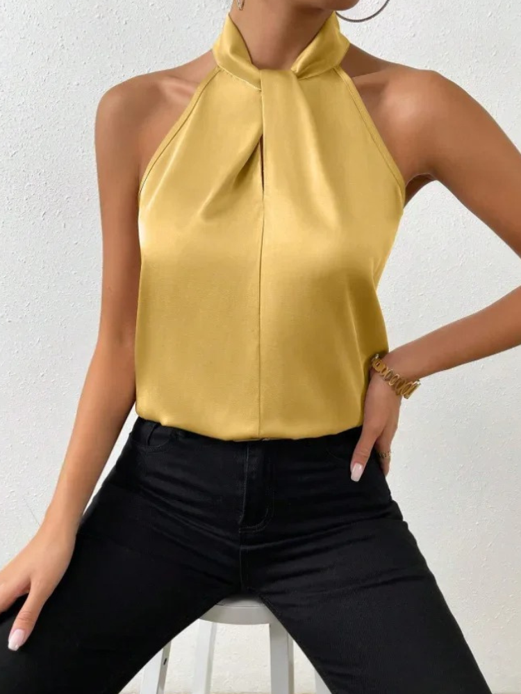 Women's satin backless camisole top with shiny finish and flirty neckline, elegant summer style