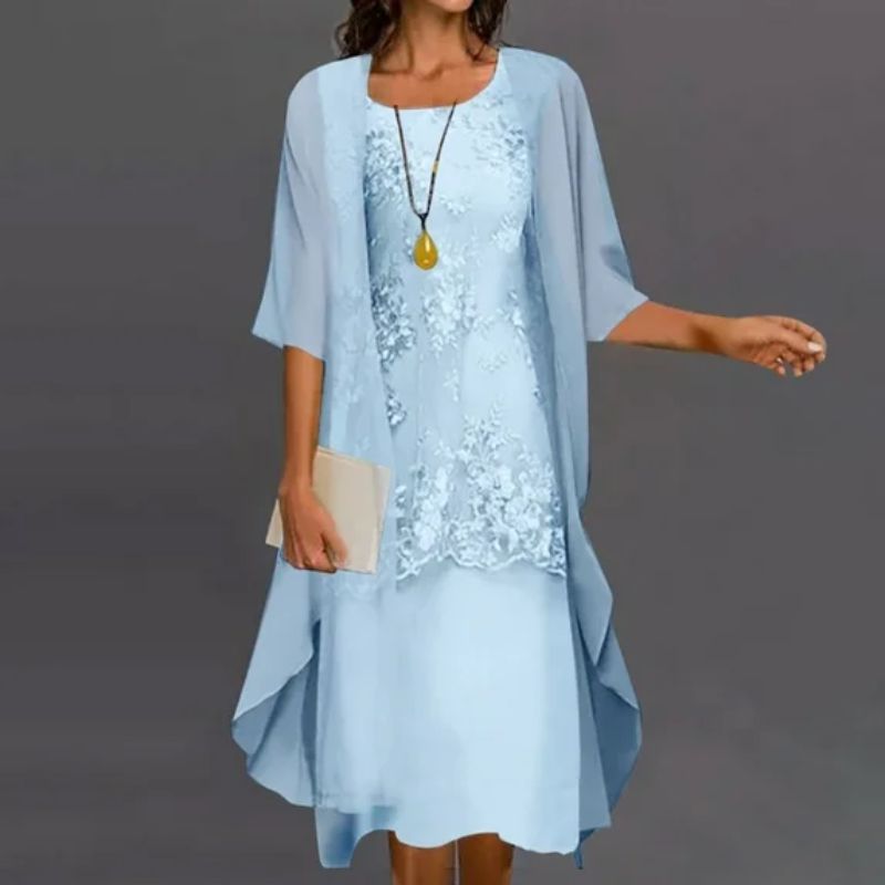 Women's vibrant floral two-piece mini dress set with matching top, chic summer style