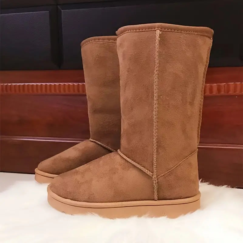Women's waterproof winter boots with soft fur lining, non-slip sole, and polished everyday style