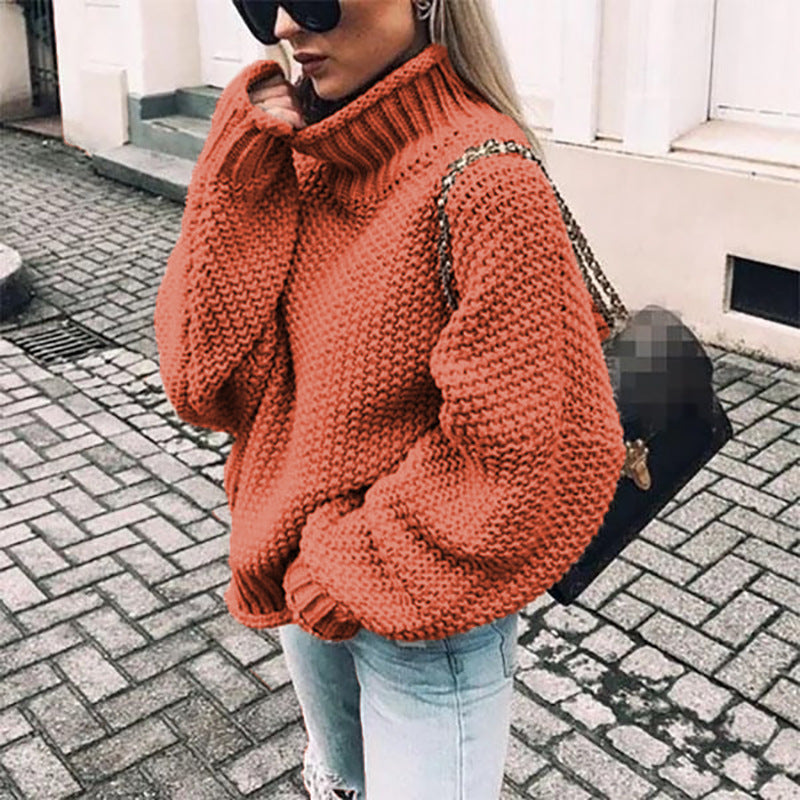 Women's chunky knit turtleneck sweater in cozy oversized fit with thick textured weave for winter warmth