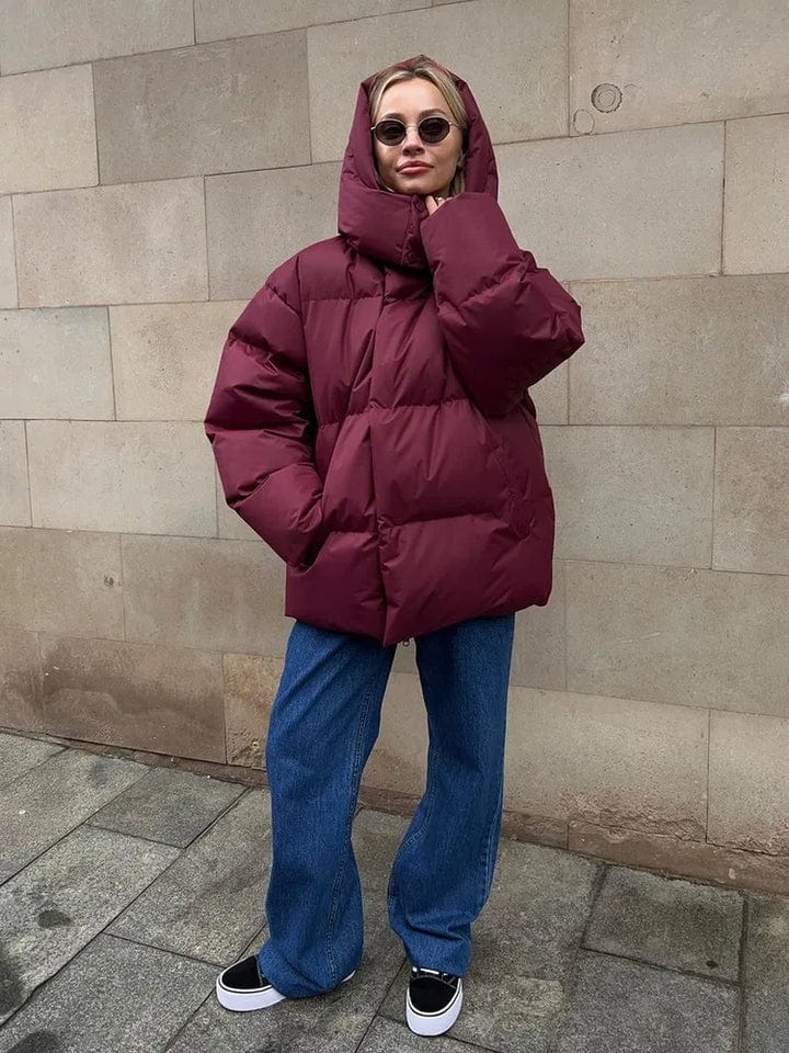 Women's black sleek puffer jacket with high-quality insulation and modern everyday silhouette