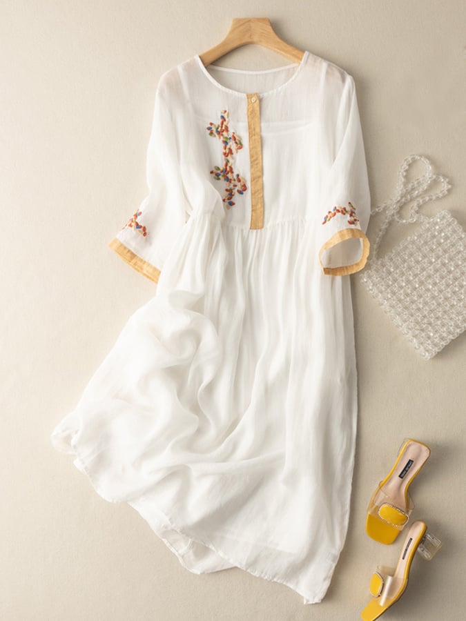 Women's relaxed fit cotton linen dress with embroidered detail, button closure, three-quarter sleeves