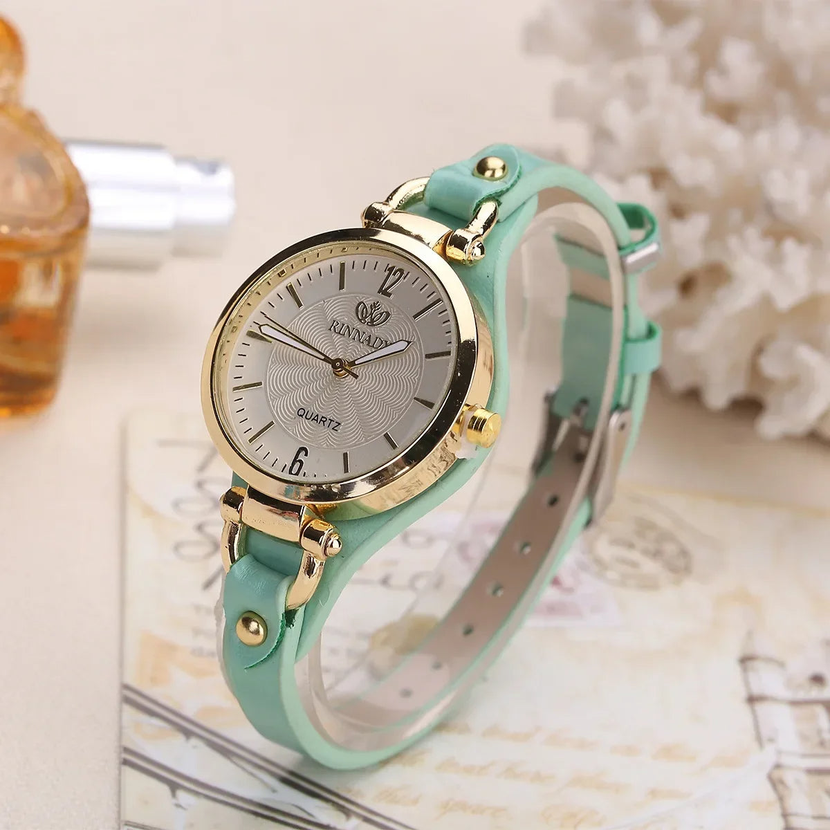 Sophie women's minimalist quartz watch gold-tone steel case vegan leather strap engraved dial