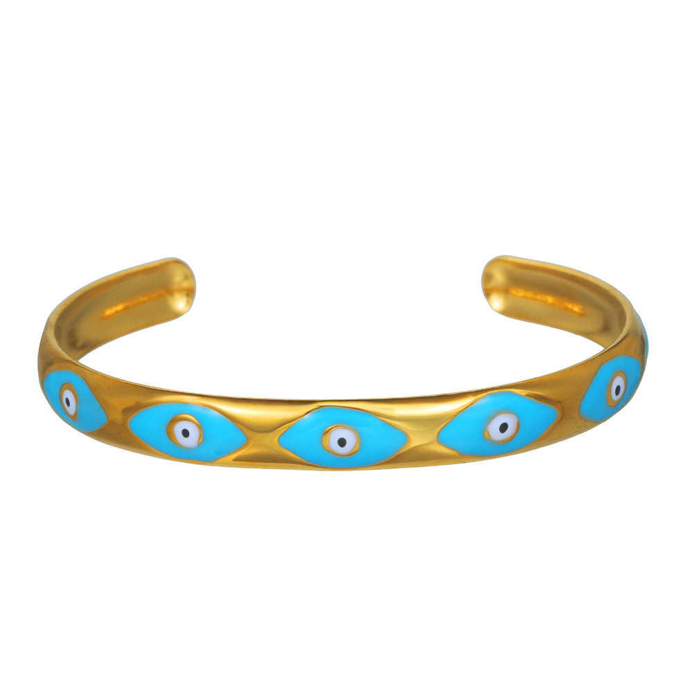 Women's gold-toned Nazar Evil Eye bracelet with colorful accents, elegant protective symbolic jewelry