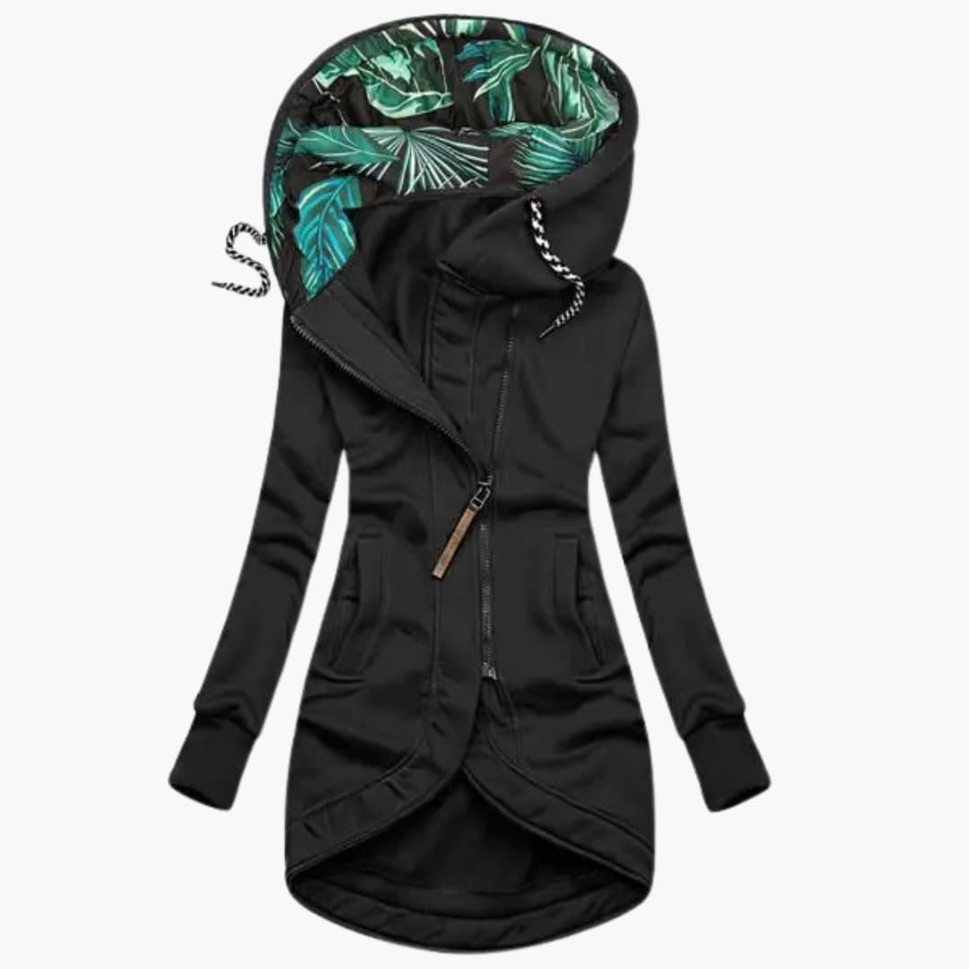 Women's quilted winter jacket with fixed hood, raised neckline, and large front pockets for cozy warmth