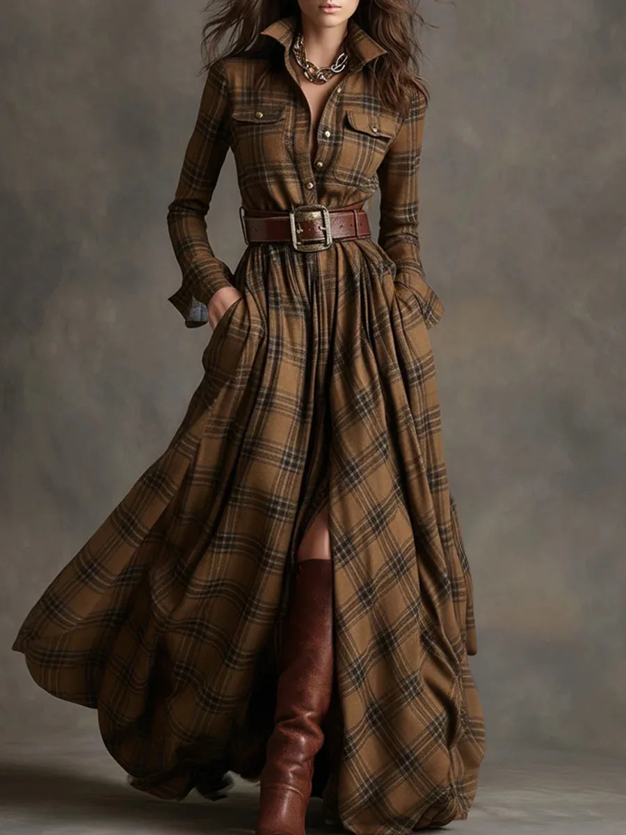 Plaid maxi dress with belted waist, structured collar, flap pockets, and full-length flowy silhouette