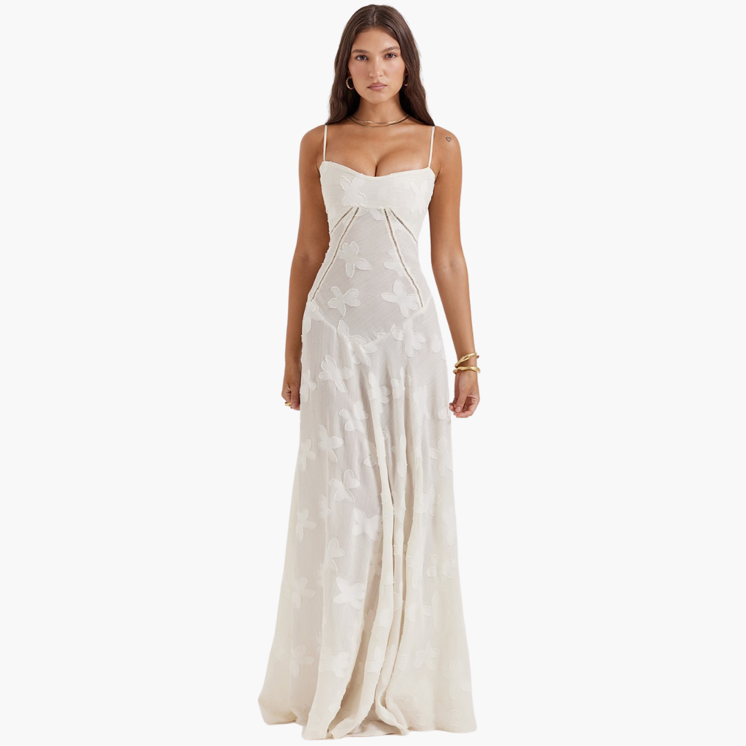Women's ivory vintage long lace gown with delicate beading and romantic floral lace details