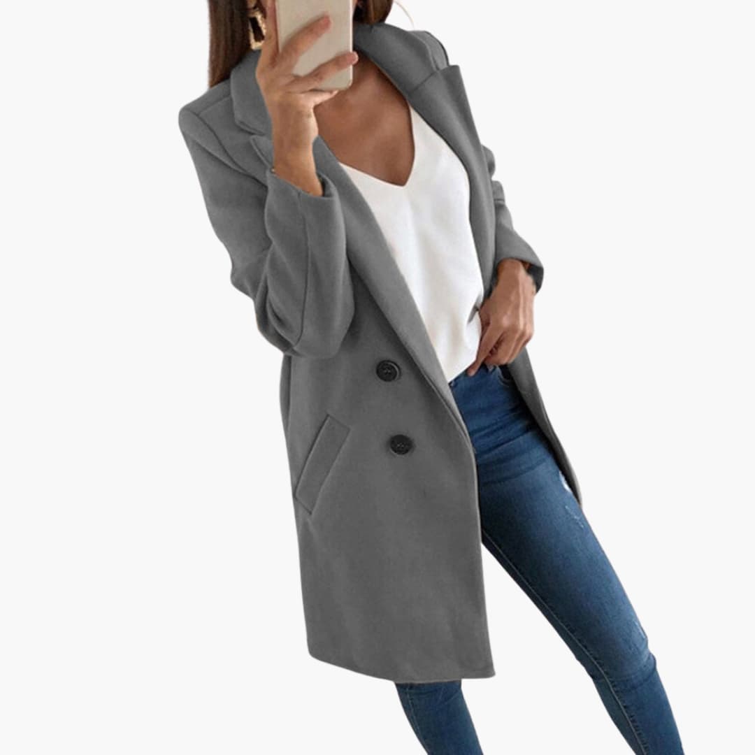 Women's long sleeve button-front coat with fold-over collar, cozy lined interior and side pockets