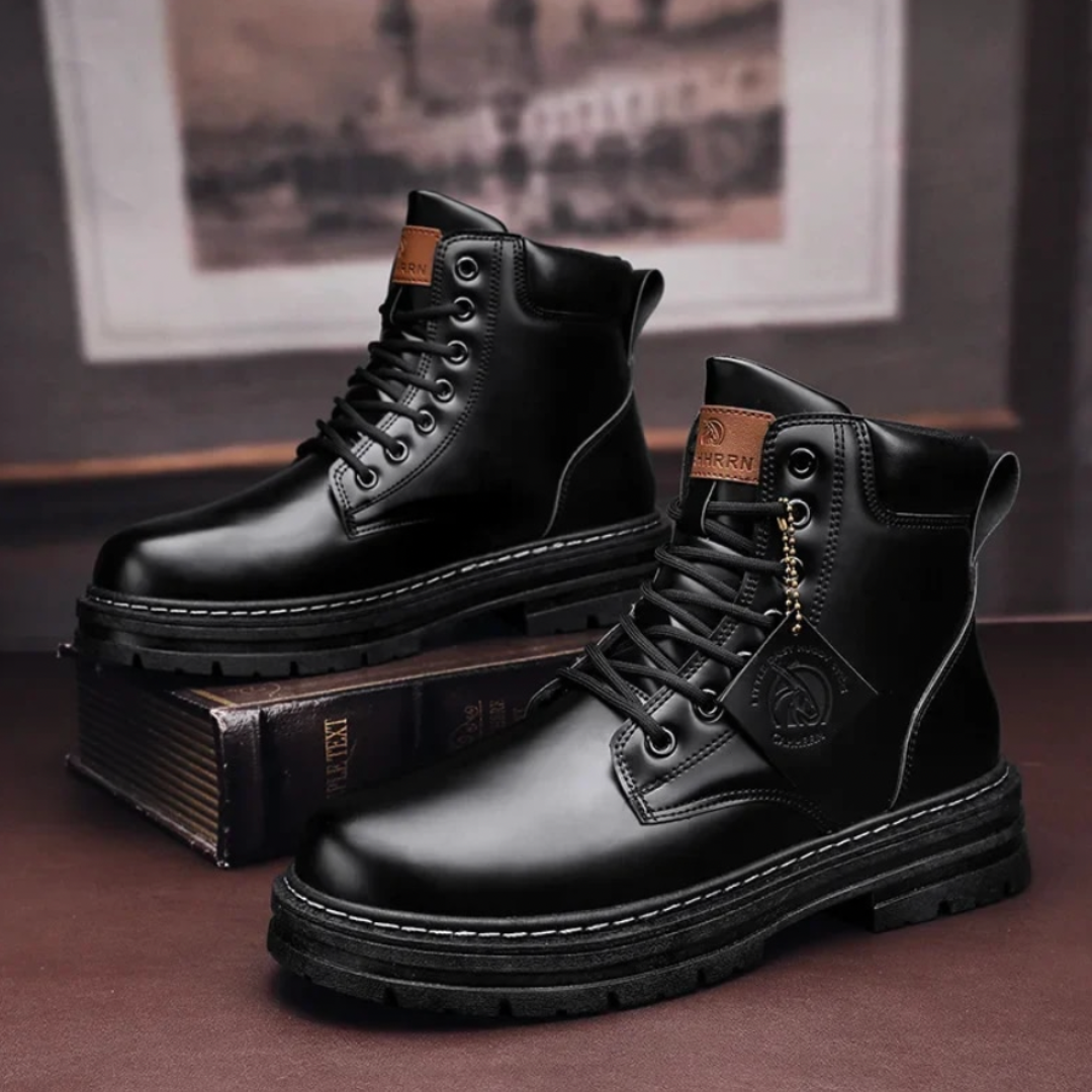 Men's black heavy-duty ankle lace-up boots with reinforced construction and rugged outdoor sole