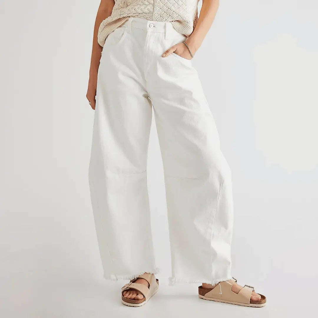 Vintage high-rise wide leg flare denim jeans distressed wash 90s retro silhouette
