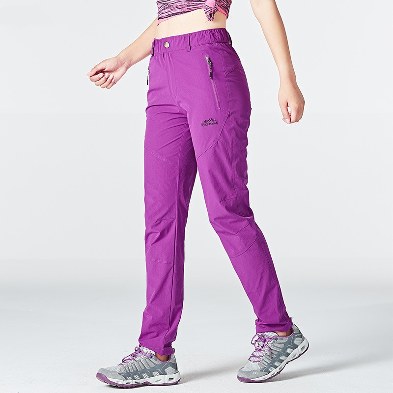 Emma waterproof women's fleece-lined pants for outdoor adventures, rain-resistant slim-fit silhouette