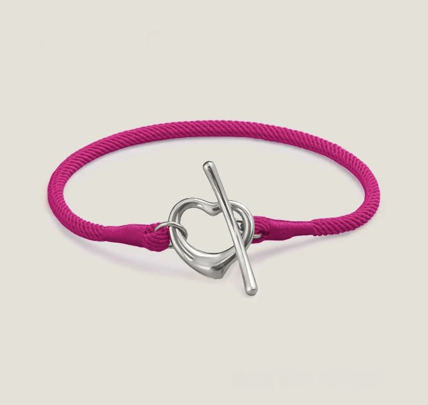 Gold-tone heart toggle rope bracelet adjustable telescopic fit tarnish-resistant minimalist design
