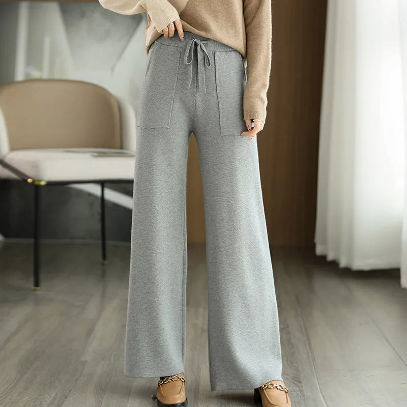 Monaco wide-leg wool pants in neutral tone, relaxed silhouette with breathable 100% premium wool fabric