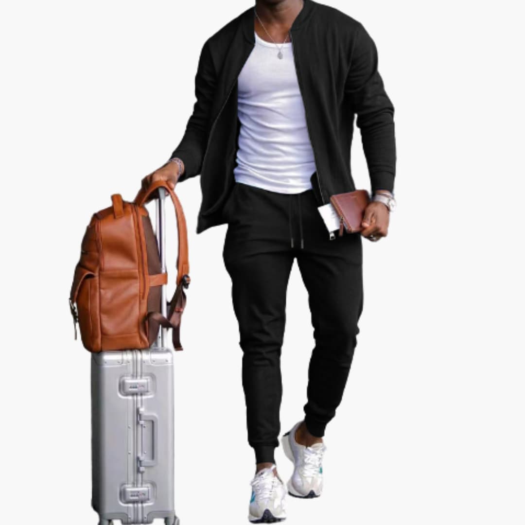 Men's textured zip jacket and tapered pants set in coordinated athleisure style with front zipper