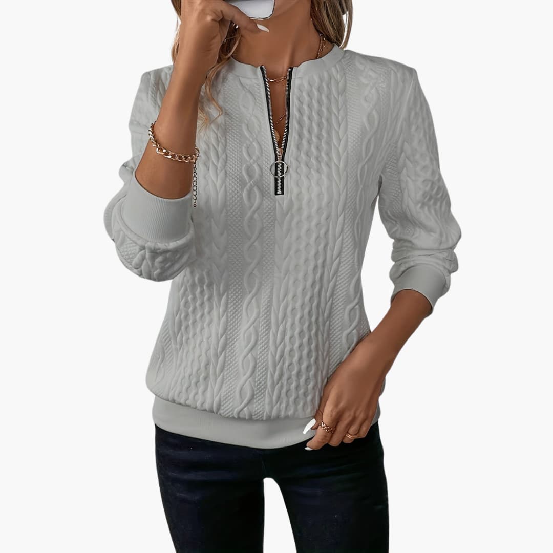 Women's cable knit pullover sweater with front zip neckline, long sleeves, and ribbed cuffs cozy classic fit