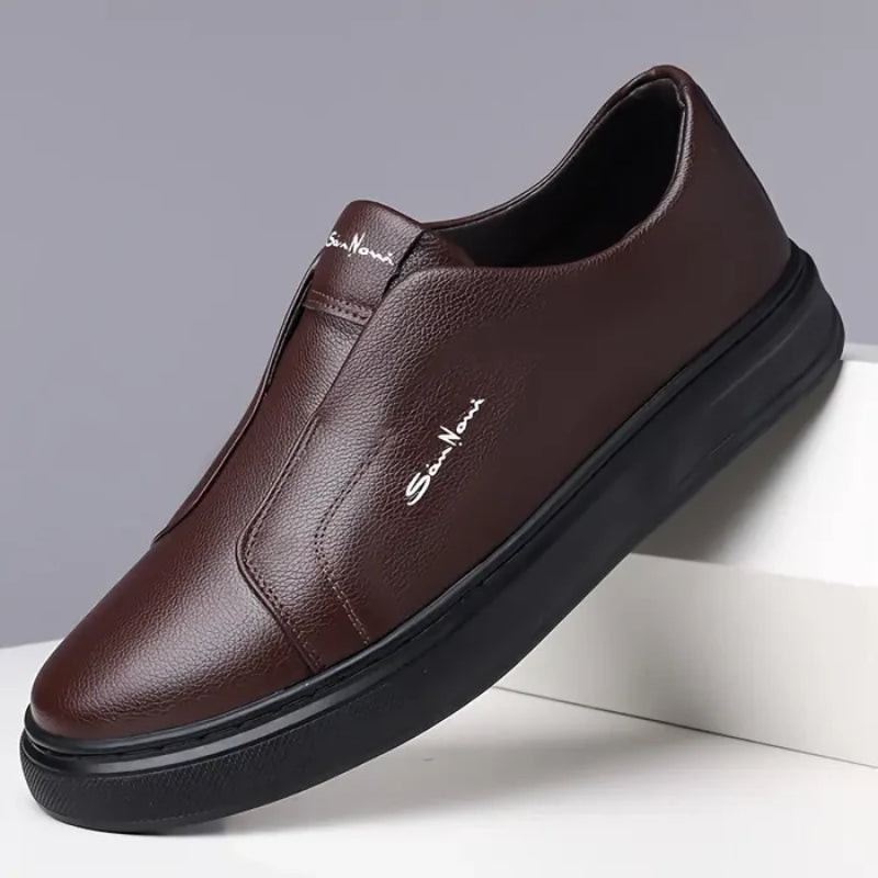 White vegan leather slip-on sneakers minimalist silhouette with cushioned insole for everyday wear