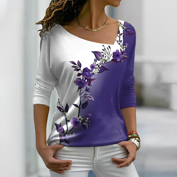Vibrant floral print t-shirt in contrasting colors, casual relaxed fit with bold botanical pattern