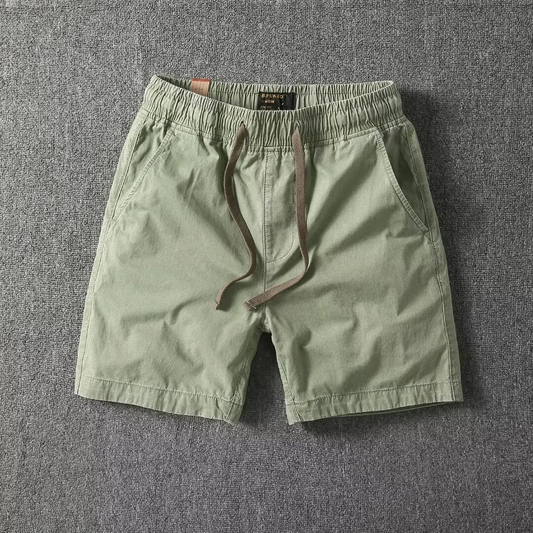 Men's washed cotton relaxed-fit shorts with elastic drawstring waist and deep pockets, vintage style