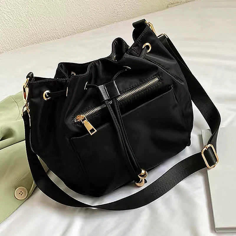 Vanta camo bucket bag women water-resistant nylon crossbody high-capacity magnetic snap closure