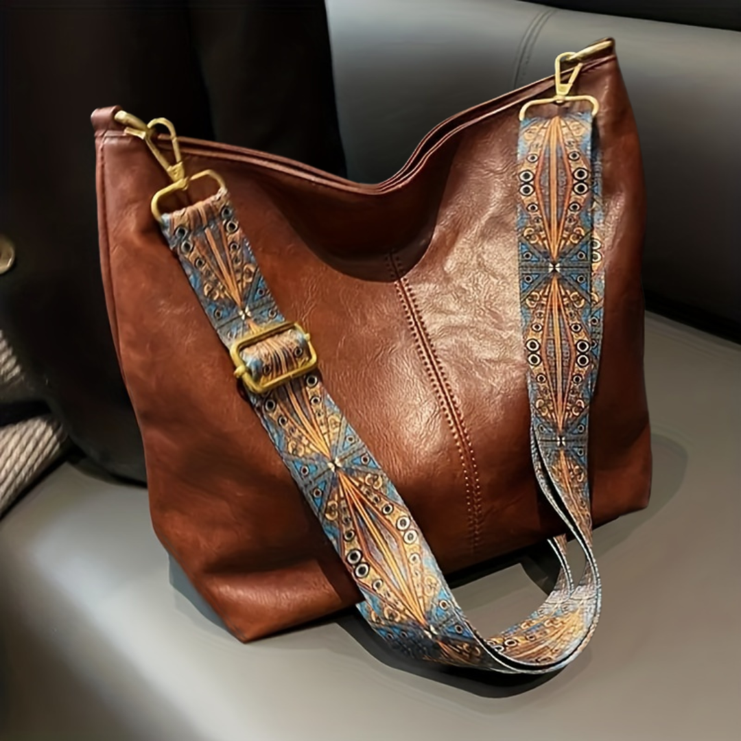 Women's shoulder bag wide adjustable strap large interior pocket versatile everyday casual style