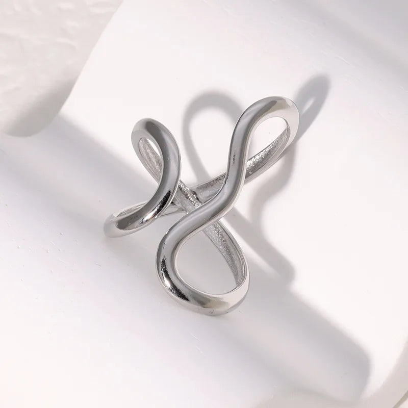 Essence Infinity Ring lightweight hypoallergenic alloy sculptural minimalist silver-tone everyday comfort band