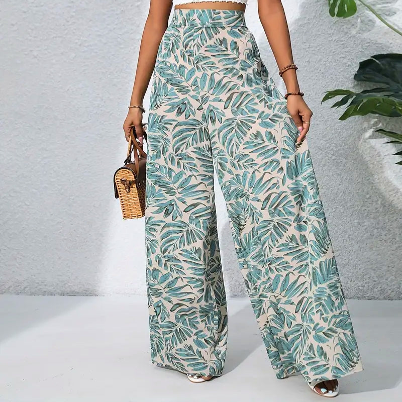 Women's tropical print high-waist relaxed cotton trousers with roomy pockets in bold colorful pattern