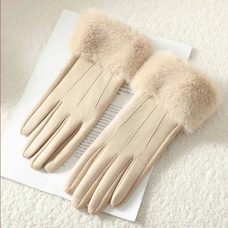 Women's black faux leather gloves with fluffy faux fur cuffs and touchscreen-compatible fingertips