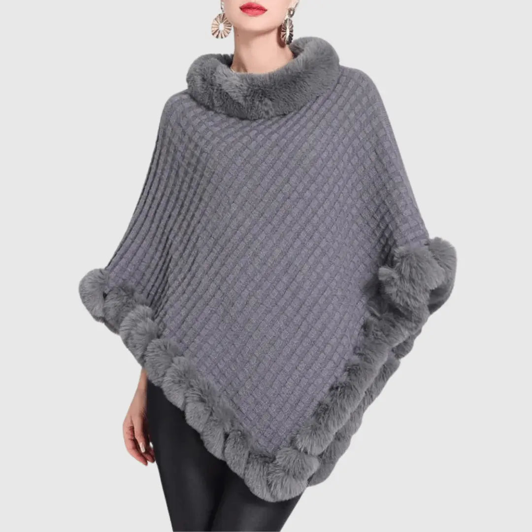 Women's chunky cable-knit poncho with faux fur trim, cozy acrylic weave in neutral tone