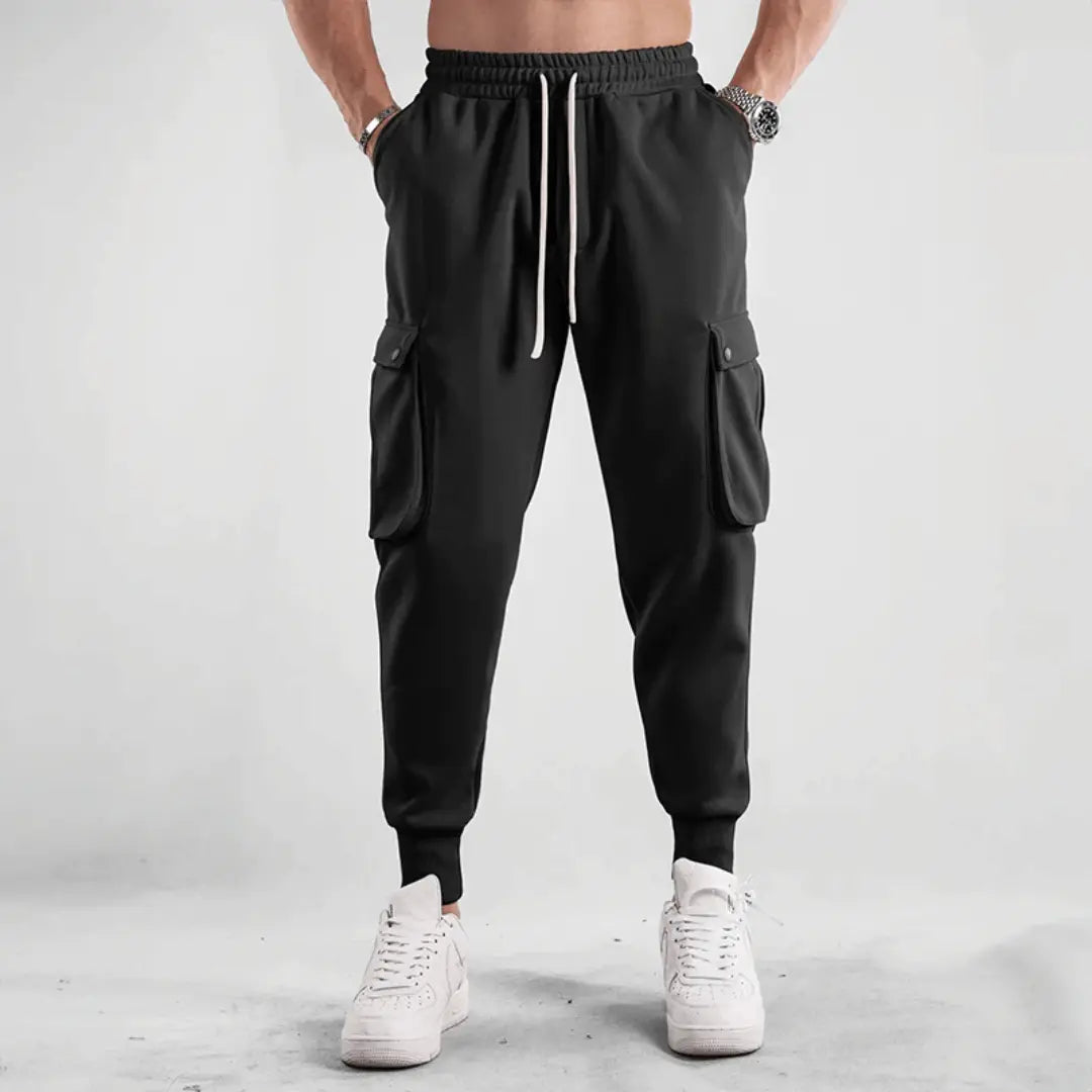 Black cargo joggers with adaptive breathable fabric, tapered street-style fit for urban runners