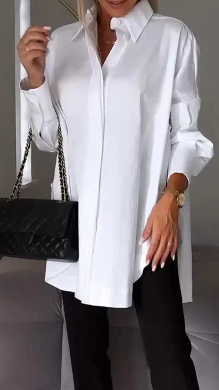 Women's oversized white blouse rolled-up sleeves relaxed silhouette easy-care casual chic fashion