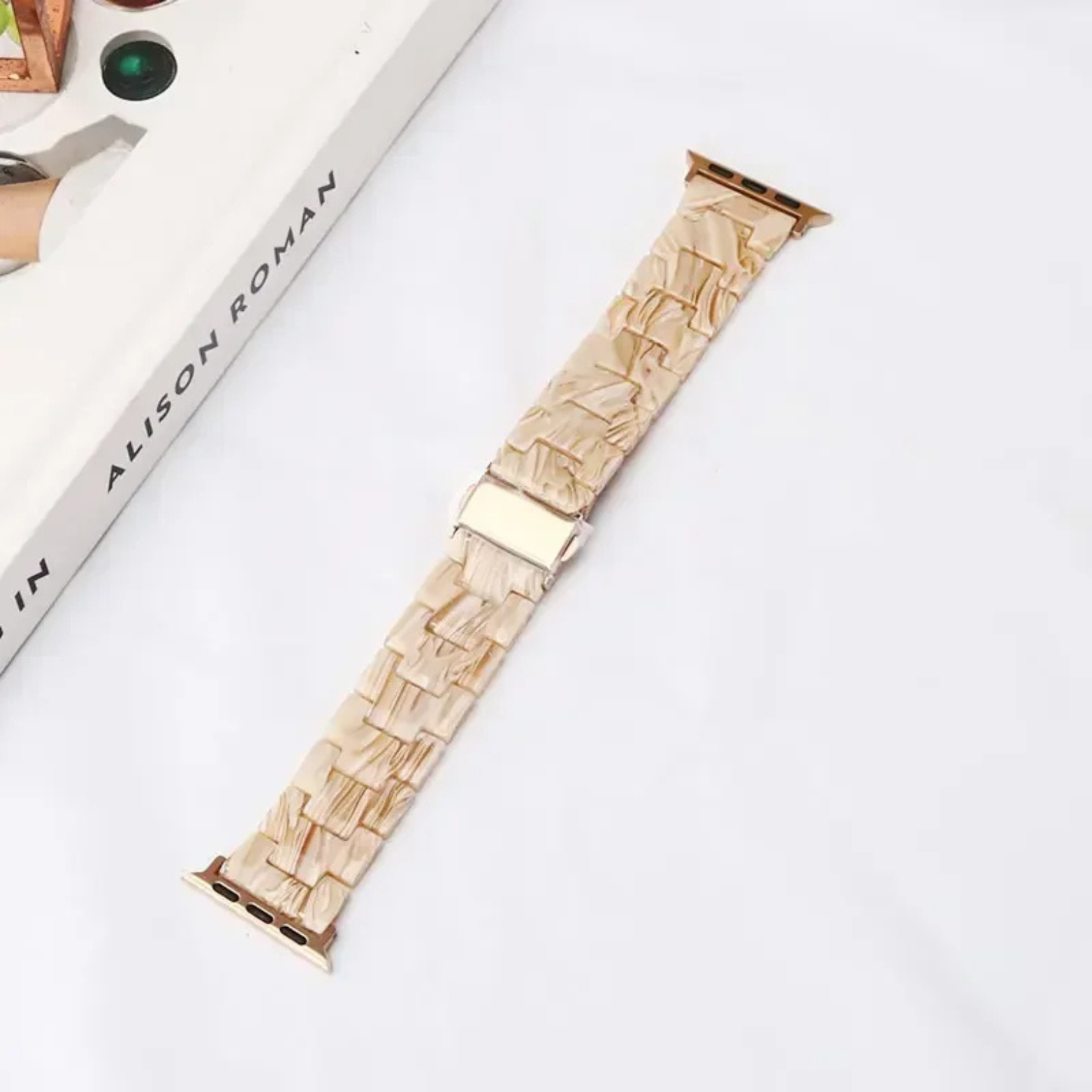 Bold marbled resin Apple Watch band with luminous high-gloss finish and scratch-resistant adjustable links
