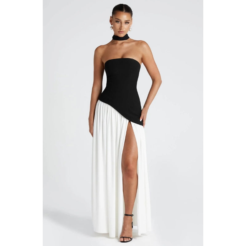 Black strapless full-length evening gown with asymmetric waist seam and collarbone-enhancing silhouette