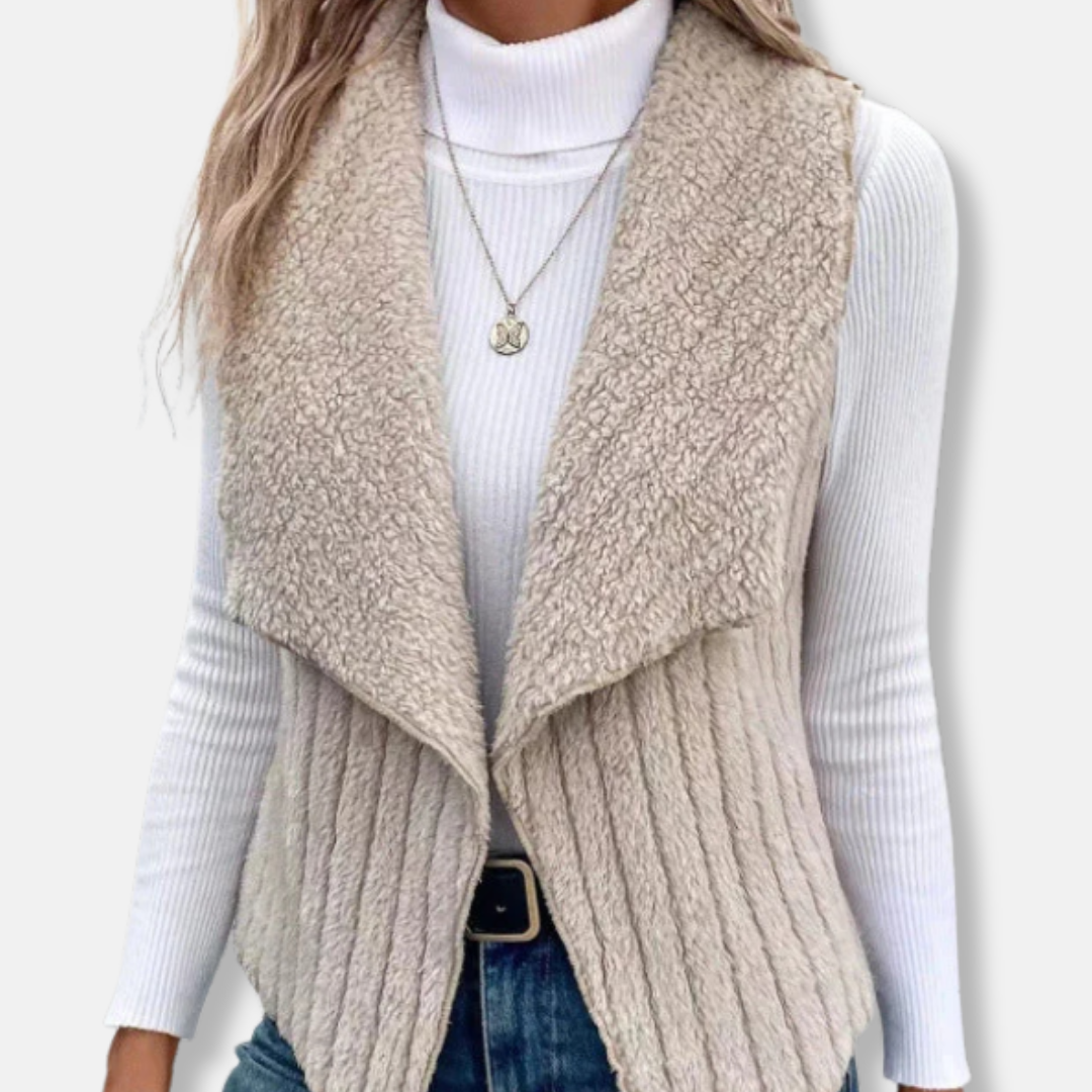 Women's sleeveless knit vest with plush shawl collar, hip-length relaxed open-front silhouette