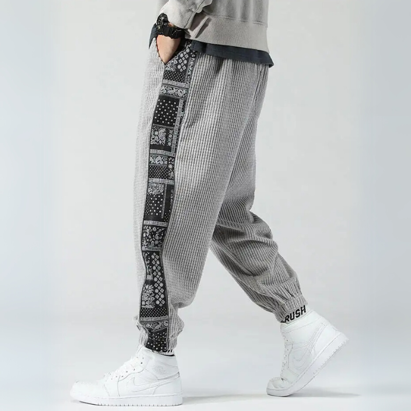 Olive corduroy joggers with bandana patchwork side panels, unisex relaxed fit streetwear
