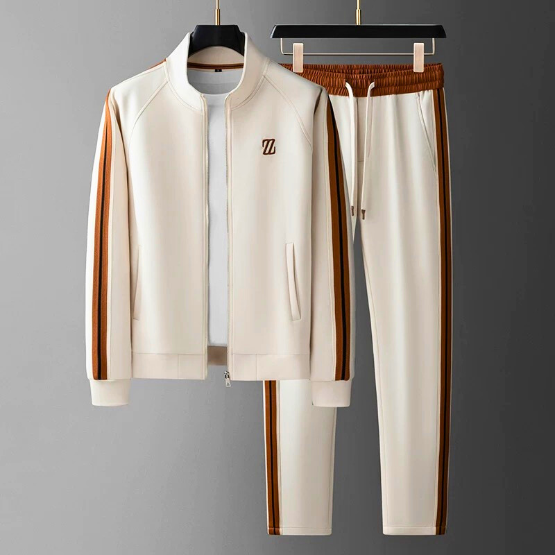 Men's streetwear jogging suit set with sleek side stripes, tapered fit zip-up jacket and jogger pants