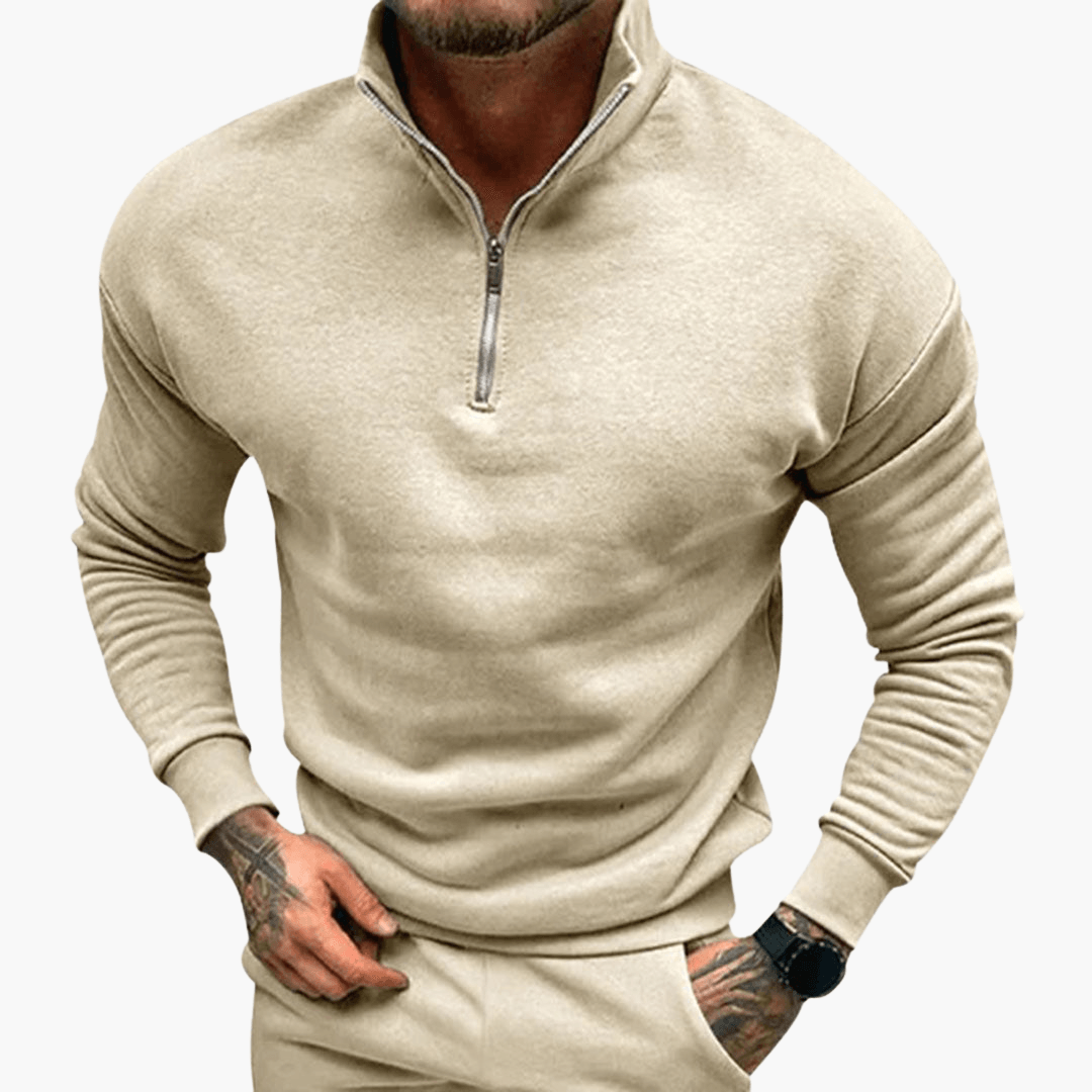Men's slim fit half-zip sweatshirt in neutral tone, versatile layering piece for travel and everyday wear