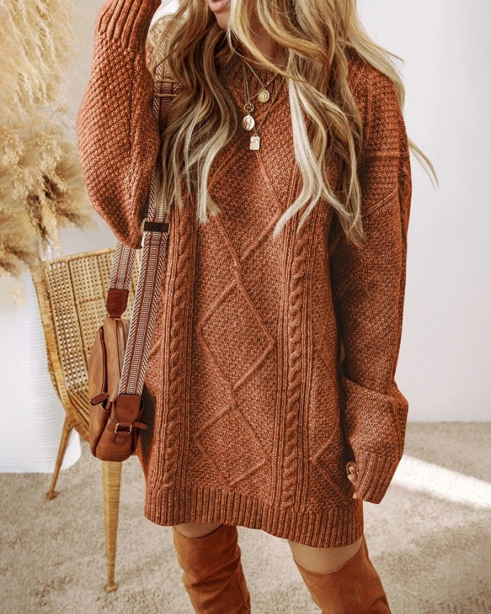 Cream oversized cable knit sweater dress with drop-shoulder silhouette and plush non-itch cotton blend