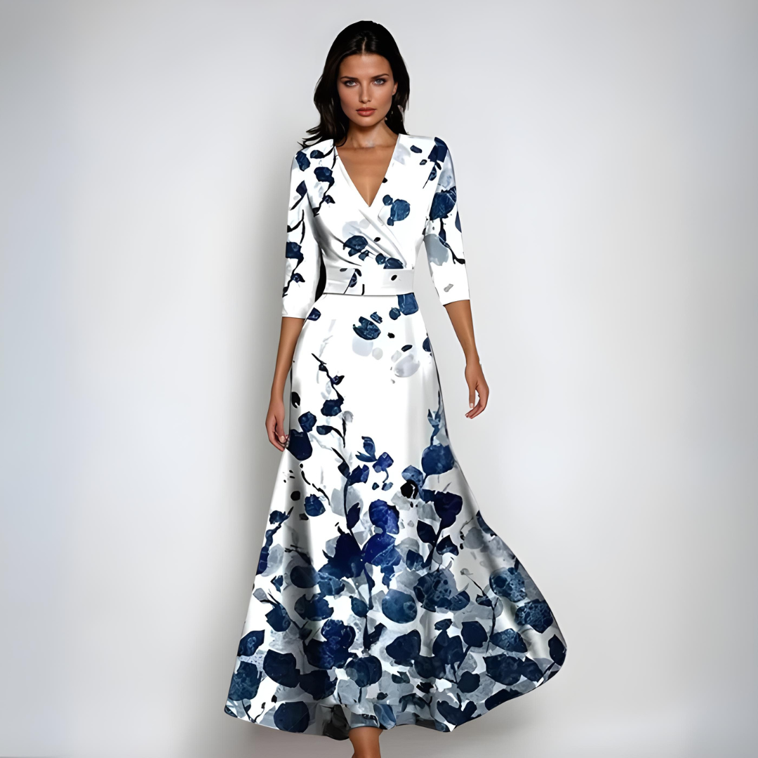 Women's floral wrap maxi dress with V-neck, fluid draping, and elegant allover print for a polished look