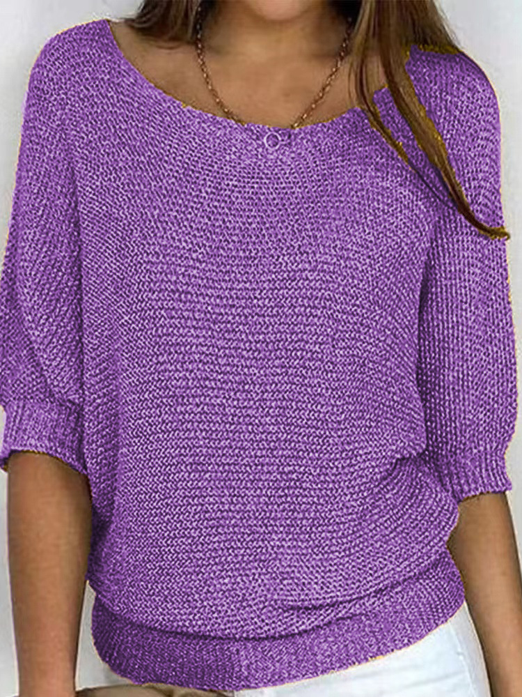 Women's cozy loose-fit knitted sweater with elbow sleeves and boat neckline for casual layering